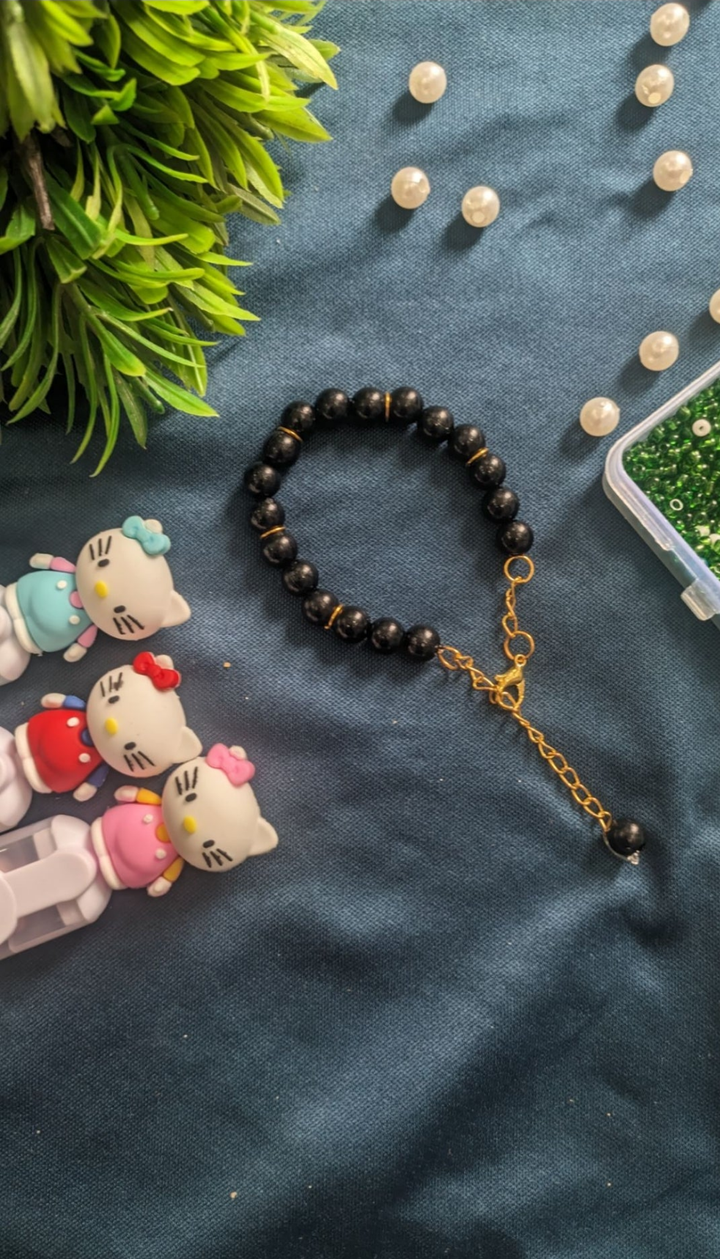 Elegant Black Stone Beaded Bracelet with Golden Chain Extension