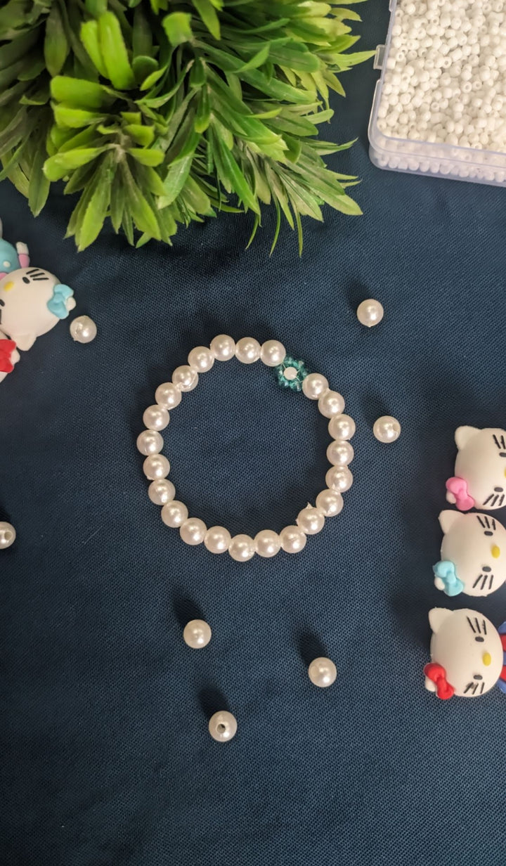 Elegant Pearl Bead Bracelet with Floral Accent