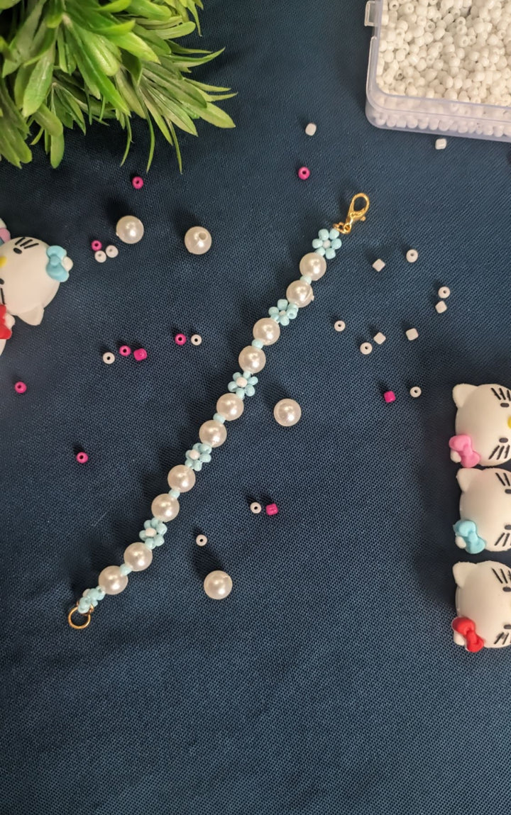 Pearl Blossom Bracelet – Blue Floral Beaded Elegance